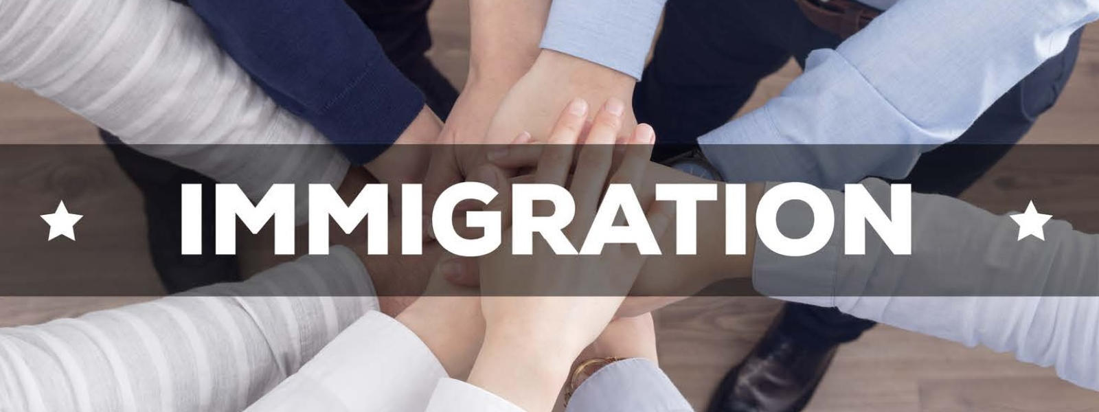 overlapping hands with immigration on top