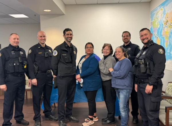 representatives from the Palatine Police,  Palatine Bank & Trust, Endeavor Health's Community Health Nurse, Harper College, and Shadrach the Comfort Dog from Prince of Peace